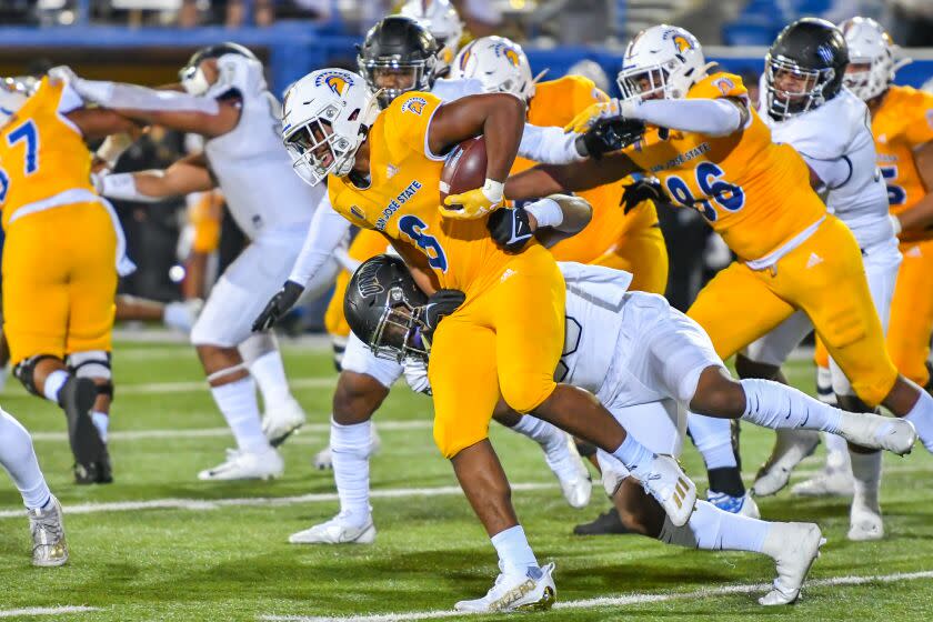 SAN JOSE, CA - OCTOBER 07: San Jose State Spartans running back Camdan McWright (6) tries cutting to the left on a run play during the game between UNLV Rebels and San Jose State Spartans on Friday, October 07, 2022 at CEFCU Stadium in San Jose, California. (Photo by Douglas Stringer/Icon Sportswire via Getty Images)