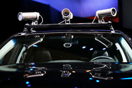 FILE PHOTO: The front end of the test vehicle Acura is using to test its autonomous Automated Drive car is pictured at the 2016 Los Angeles Auto Show in Los Angeles, California, U.S., November 16, 2016. REUTERS/Mike Blake/File Photo