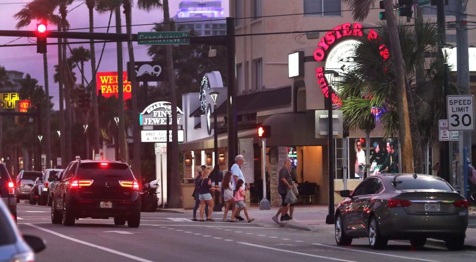 Crowds cross busy Seabreeze Boulevard at Grandview Avenue earlier this summer. After a quadruple-shooting near that intersection this past weekend, neighborhood residents are calling for more to be done to curb late-night crime on the landmark Daytona Beach thoroughfare.