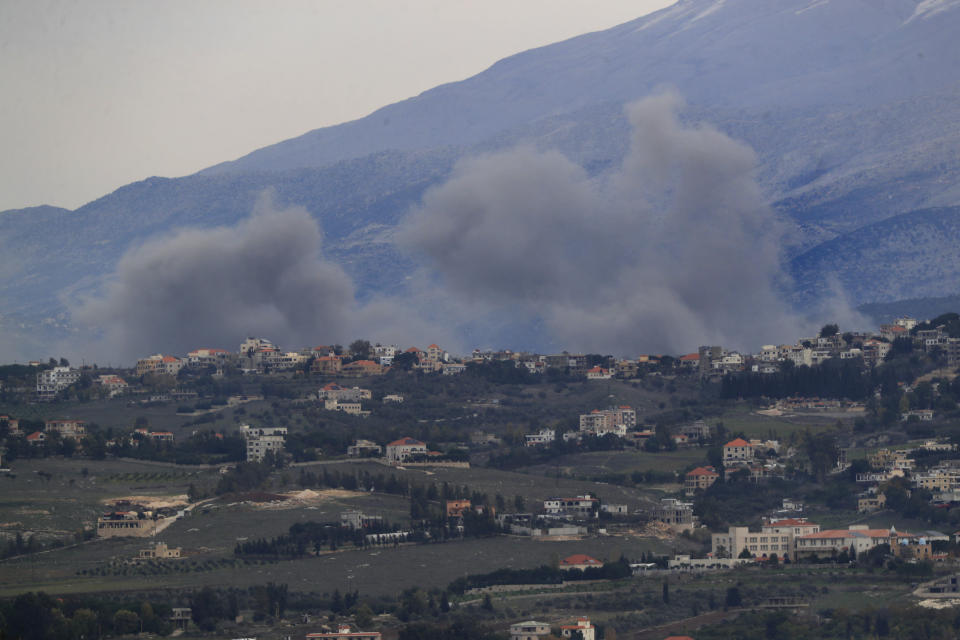 Smoke rises after Israeli air strikes on the outskirts of Khiam, a town near the Lebanese-Israeli border, seen from the town of Marjayoun, south Lebanon, Thursday, Dec. 21, 2023. Lebanon's militant Hezbollah group has been exchanging fire with Israeli troops along the tense frontier, which seen violent exchanges since Oct. 8 a day after the Palestinian militant Hamas group attacked southern Israel. (AP Photo/Mohammed Zaatari)