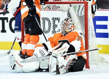 Apr 18, 2016; Philadelphia, PA, USA; Philadelphia Flyers goalie Steve Mason (35) reacts after goal by Washington Capitals during the third period in game three of the first round of the 2016 Stanley Cup Playoffs at Wells Fargo Center. The Capitals defeated the Flyers, 6-1. Eric Hartline-USA TODAY Sports