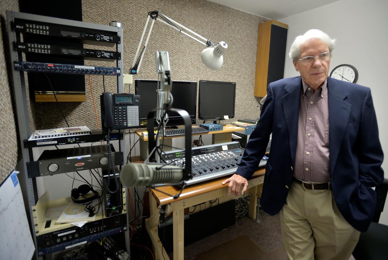 In this photo from 2014, Clarence Barinowski, president of GNN Radio, stands with some of the network's equipment. GNN got the rezoning it wanted Tuesday for its property, but the approval came with conditions.