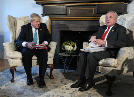 Britain's Foreign Secretary Boris Johnson and Acting U.S. Secretary of State John Sullivan sit down in the office of the chancellor at the University of Toronto to begin an informal bilateral meeting during G7 foreign ministers meetings, in Toronto, Ontario, Canada April 22, 2018. Dave Clark/Pool via REUTERS