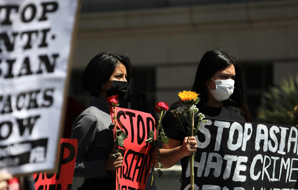 People participate in a Stop Asian Hate rally and march at City Hall in Los Angeles, on March 27, 2021.<span class="copyright">Xinhua/Getty Images</span>