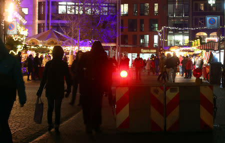 Concrete barricades stand at the entrance of the Christmas market in Regensburg, Germany, November 27, 2017. REUTERS/Michael Dalder