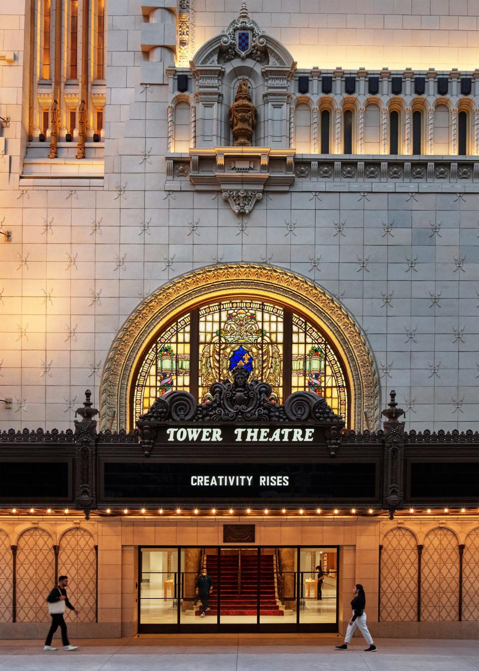 An exterior view of the Tower Theater Apple Store