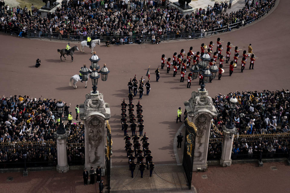 Scots Guards and troops from France's 1er Regiment de le Garde Republicaine partake in the Changing of the Guard ceremony at Buckingham Palace, to commemorate the 120th anniversary of the Entente Cordiale - the historic diplomatic agreement between Britain and France which laid the groundwork for their collaboration in both world wars, in London, Monday, April 8, 2024. France is the first non-Commonwealth country to take part in the Changing of the Guard. (Aaron Chown/PA via AP)