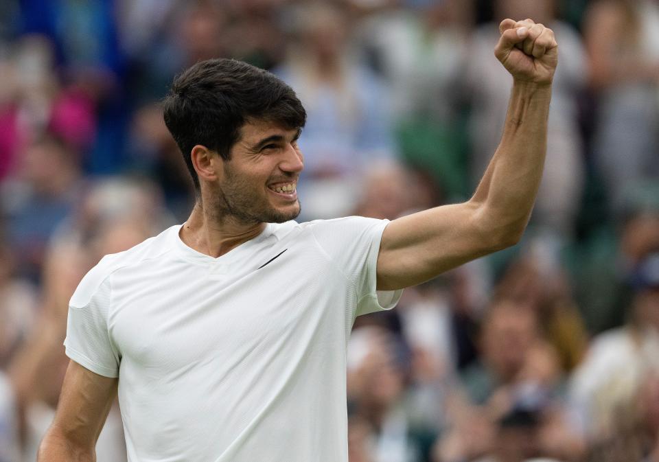 Jul 9, 2024; London,United Kingdom; Carlos Alcaraz of Spain celebrates winning his match against Tommy Paul of the United States (not shown) on day nine of The Championships at All England Lawn Tennis and Croquet Club.