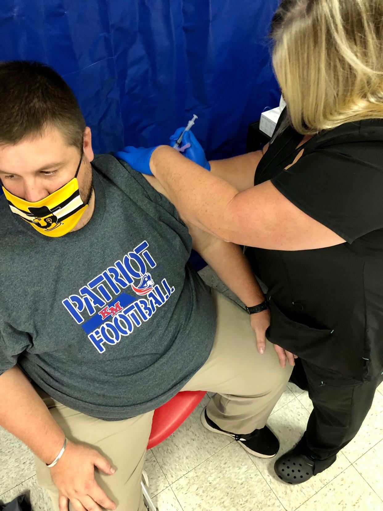 Wilder Clark receives his first dose of the COVID-19 vaccine on Wednesday at Kings Mountain Middle School in this Star file photograph.