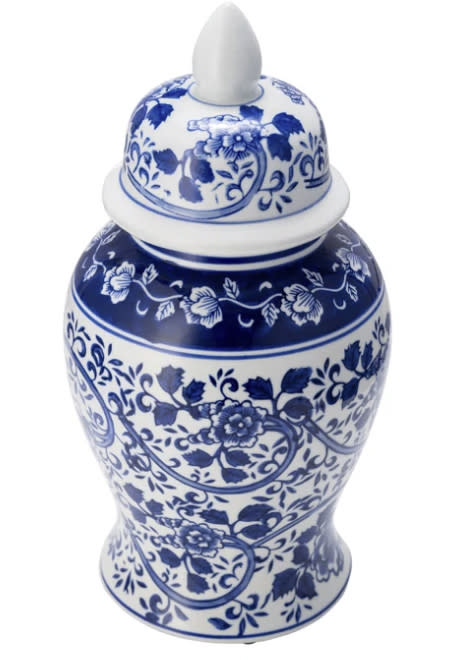 A porcelain jar with a lid, decorated with intricate floral patterns