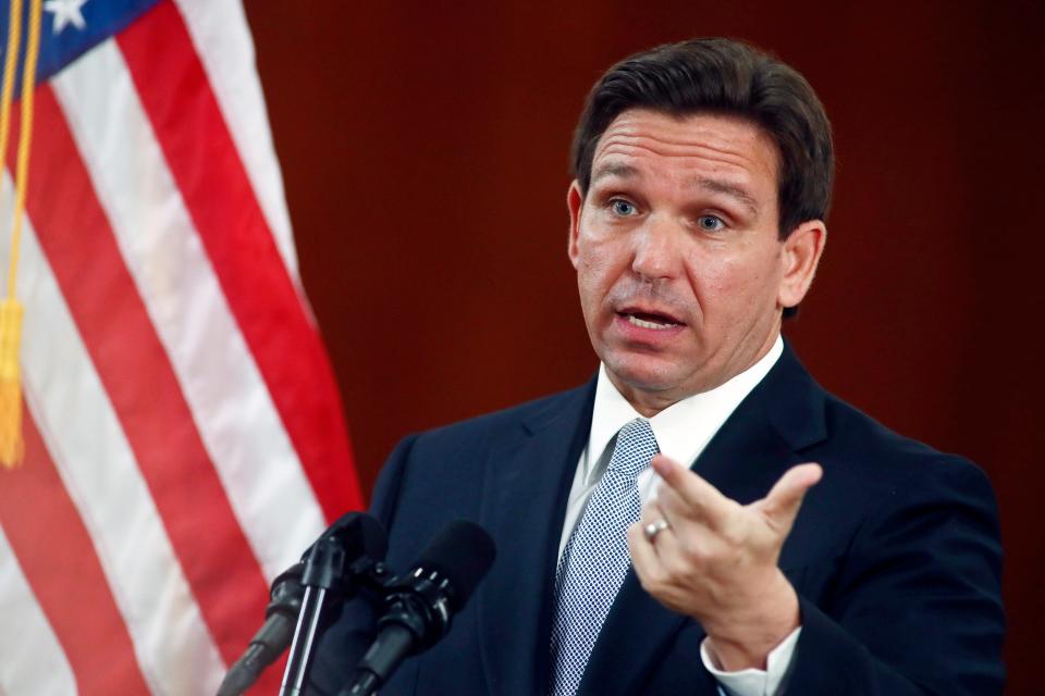 Florida Gov. Ron DeSantis answers questions from the media in the Florida Cabinet following his State of the State address during a joint session of the Senate and House of Representatives, Tuesday, March 7, 2023, at the state Capitol in Tallahassee, Fla. DeSantis' administration is moving to unilaterally forbid classroom instruction on sexual orientation and gender identity in all grades, expanding the controversial law critics call “Don't Say Gay” as the Republican governor continues a focus on cultural issues ahead of his expected presidential run.