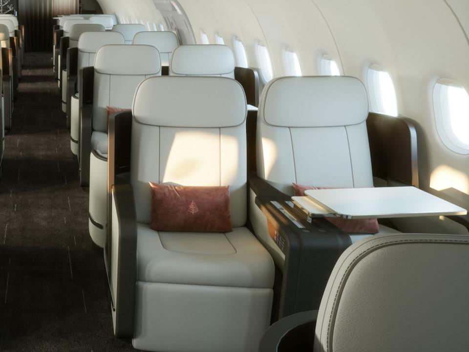 Inside the private jet with seating areas.