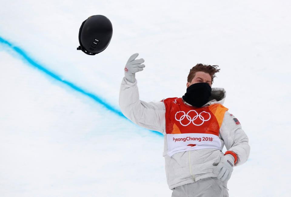 <p>American snowboarder Shaun White had a massive 94.25 opening run to open the halfpipe finals. After his run, he threw his helmet into the crowd to celebrate. REUTERS/Issei Kato TPX IMAGES OF THE DAY </p>