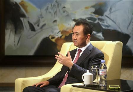 Wang Jianlin, chairman of Chinese property developer Dalian Wanda Group, answers a question during a Reuters interview in Qingdao, Shandong province, September 22, 2013. REUTERS/Jason Lee