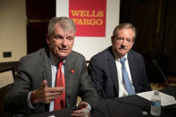 Wells Fargo CEO Tim Sloan (L) and Chairman Stephen Sanger answer questions from reporters after the annual shareholder meeting in Jacksonville, Florida, U.S., April 25, 2017. REUTERS/Phelan Ebenhack