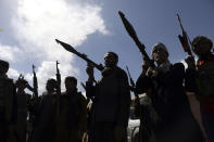 Afghan militiamen join Afghan defense and security forces during a gathering in Kabul, Afghanistan, Wednesday, June 23, 2021. Taliban gains in north Afghanistan, the traditional stronghold of the country's minority ethnic groups who drove the insurgent force from power nearly 20 years ago, has driven a worried government to resurrect militias whose histories have been characterized by chaos and widespread killing. (AP Photo/Rahmat Gul)