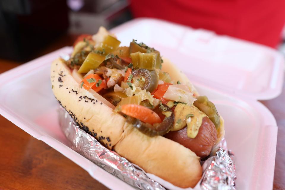 The "Wrigleyville", a Chicago-style hot dog by Mac McIntyre of the Hot-n-Heavy Memphis Dogs hot dog stand on the corner of Main Street and Union Avenue downtown Memphis on Friday, July 12, 2019.