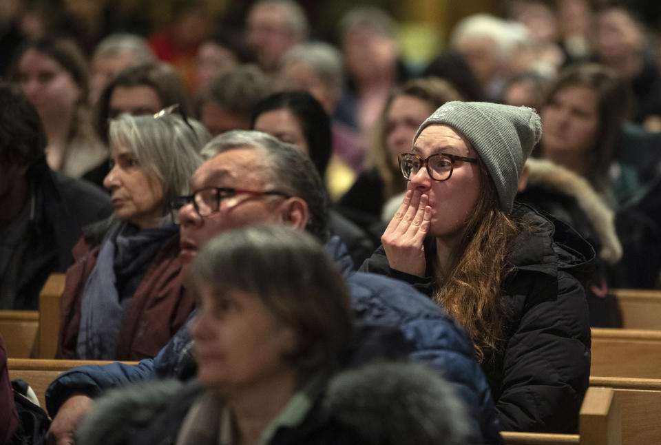 Community members gather and hold a vigil for the six people killed in a plane crash, in Fort Smith, Northwest Territories, on Wednesday, Jan. 24, 2024. (Jason Franson/The Canadian Press via AP)