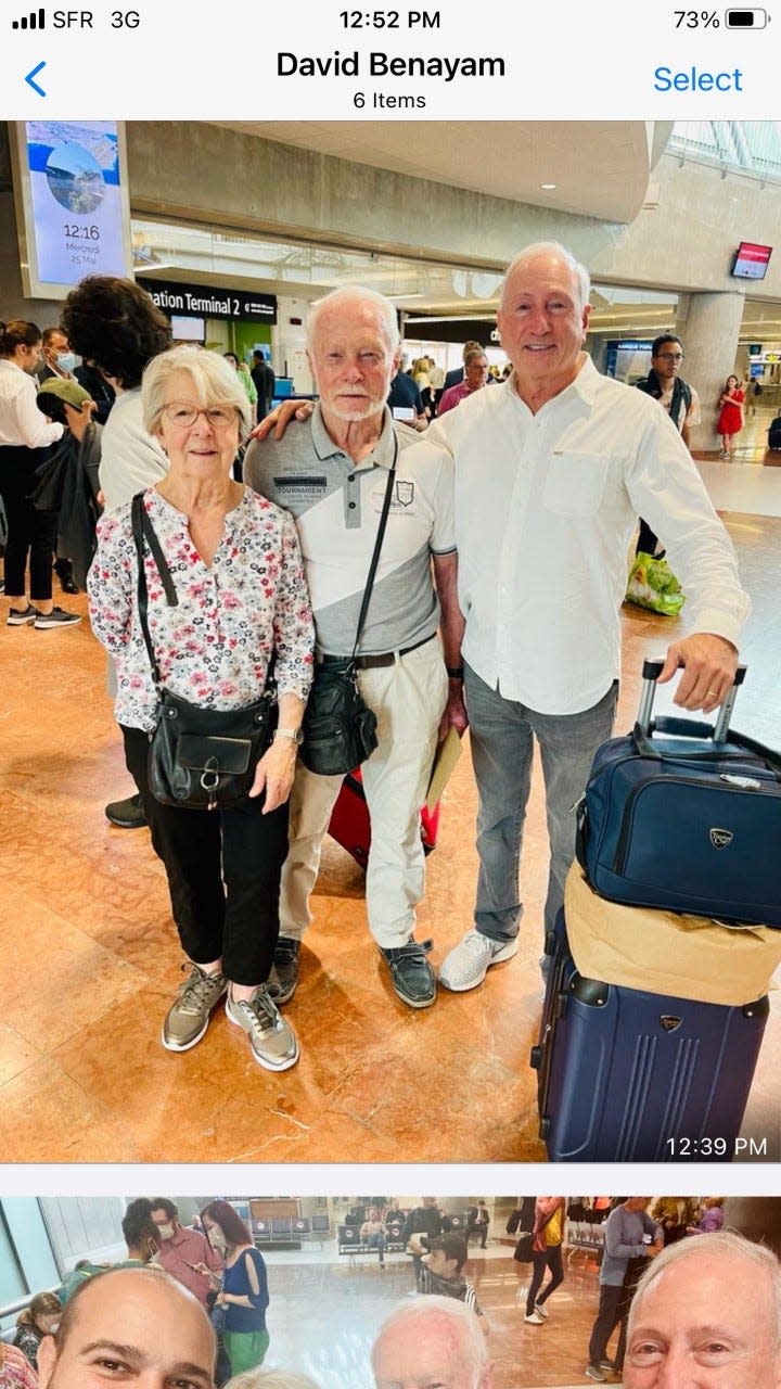 Frank La Grua, right, poses with Robert Dumesnil and his wife, Claudine.