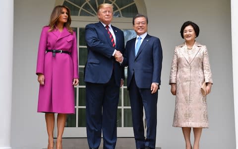 Presidents Trump and Moon with First Ladies Melania Trump and Kim Jung-sook - Credit: Nicholas Kamm/AFP