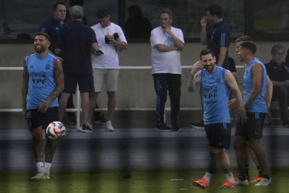 Soccer superstar Lionel Messi, second from right, reacts during practice with the Argentina national soccer team in Beijing, Tuesday, June 13, 2023. Argentina is scheduled to play Australia in a friendly match in China's capital on Thursday. (AP Photo/Ng Han Guan)