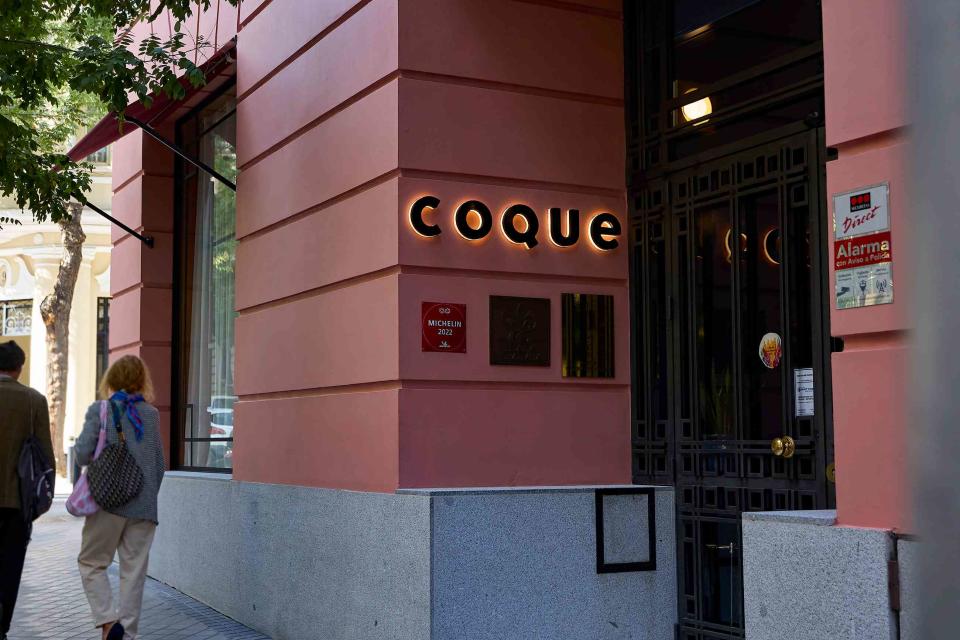 <p>Europa Press News / Getty Images</p> Entrance to chef Mario Sandoval's restaurant Coque in Madrid