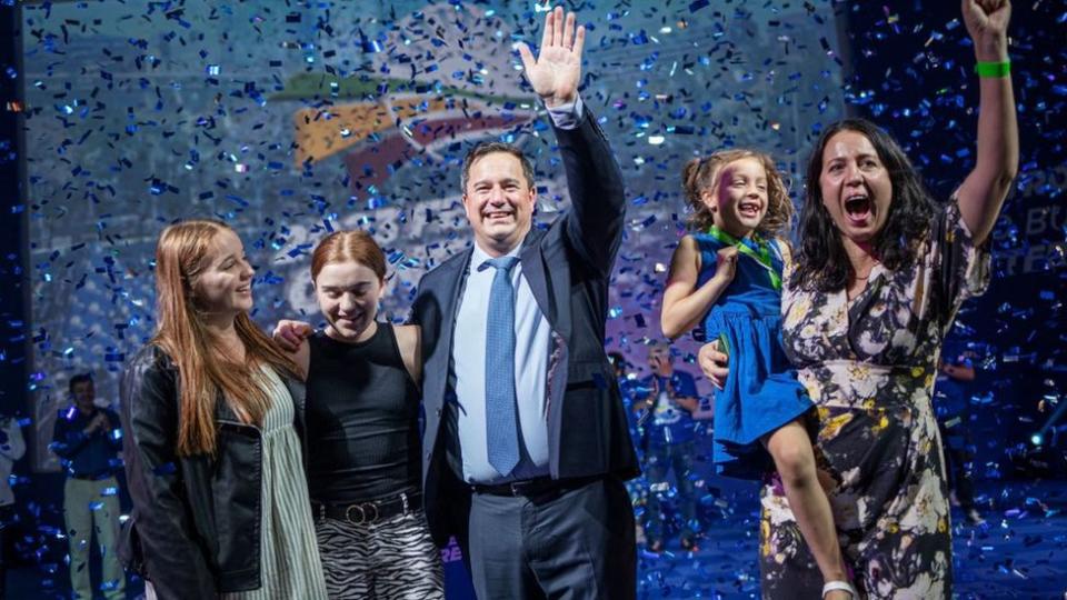 South African main opposition party Democratic Alliance (DA) newly elected federal leader John Steenhuisen rejoices with his family on the stage of the party's Federal Congress in Midrand, Johannesburg on April 2, 2023.