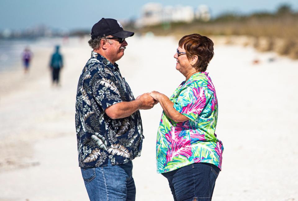 Greg and Barb Rhodes renew marriage vows during a service at Lovers Key State Park on Monday, Feb. 14, 2022. It is an annual event that is held on Valentines Day. The event is held by the Friends of Lovers Key.  