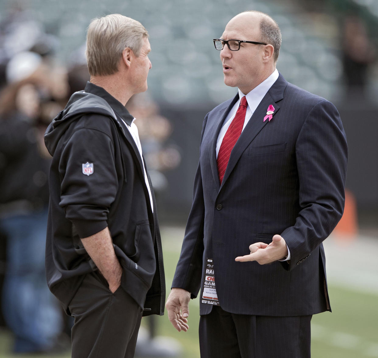 Scott Pioli, right, has been recognized by the NCAA for his work to advance diversity and inclusion in sports. (Getty Images)