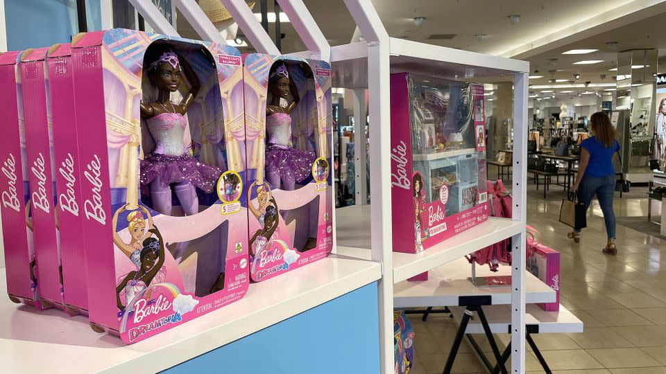 Barbie merchandise is displayed at a Macy's store on July 25 in Corte Madera, California. Retailers around the world are seeing a surge in sales of Barbie-influenced fashion and accessories as the new movie sets box office records. - Justin Sullivan/Getty Images