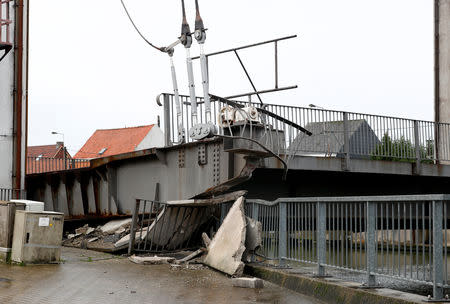 View of damage of a Humbeek lift bridge, after it was lowered onto a barge, in Humbeek near Brussels, Belgium, January 17, 2019. REUTERS/Francois Lenoir