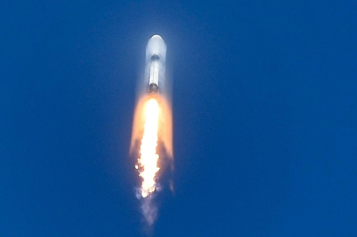 A SpaceX Falcon 9 rocket carrying 23 Starlink satellites breaks through the sound barrier on April 28.