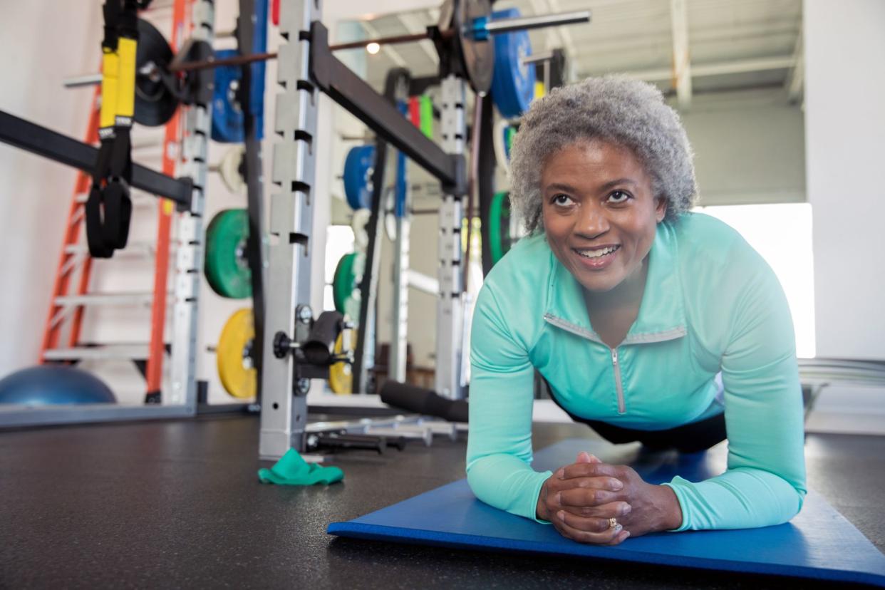 middle-aged woman planking