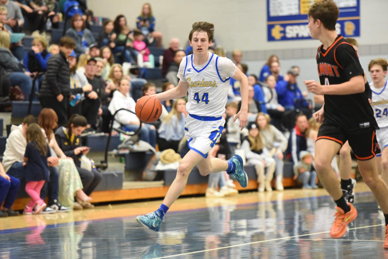 Imlay City's Zander Nash pushes the ball during a game earlier this season. He was named to one of the Times Herald's All-Blue Water Area boys basketball teams for 2024.