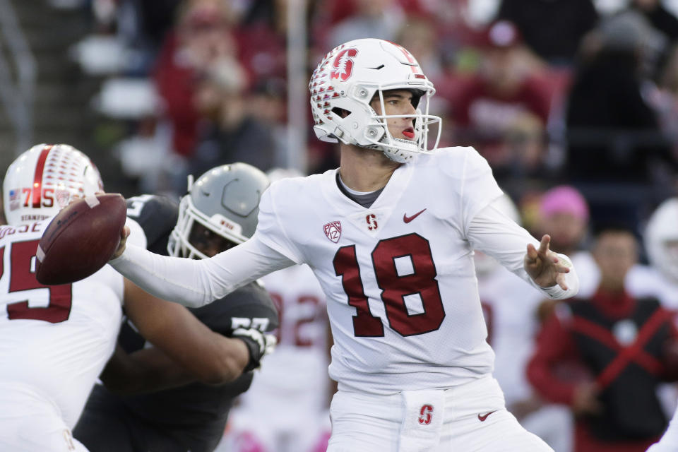 Stanford quarterback Tanner McKee throws a pass during the first half of the team's NCAA college football game against Washington State, Saturday, Oct. 16, 2021, in Pullman, Wash. (AP Photo/Young Kwak)