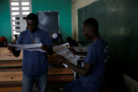 Electoral workers count ballots at a polling station in Les Cayes, Haiti, November 20, 2016. REUTERS/Andres Martinez Casares