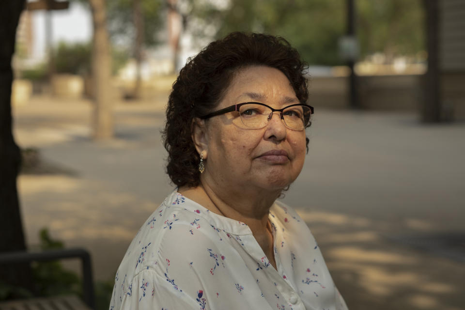 May Sarah Cardinal sits for a portrait outside the Law Courts building in Edmonton, Alberta, Canada on Thursday, May 25, 2023. Cardinal said she was pressured into having her tubes tied when she was 20. “The doctor told me: ‘There are hard times ahead and how are you going to look after a bunch of kids? What if your husband leaves?' ... I was afraid if I didn’t go through with it, they would be angry with me, and I didn’t feel like I had a say.” (AP Photo/Amber Bracken)