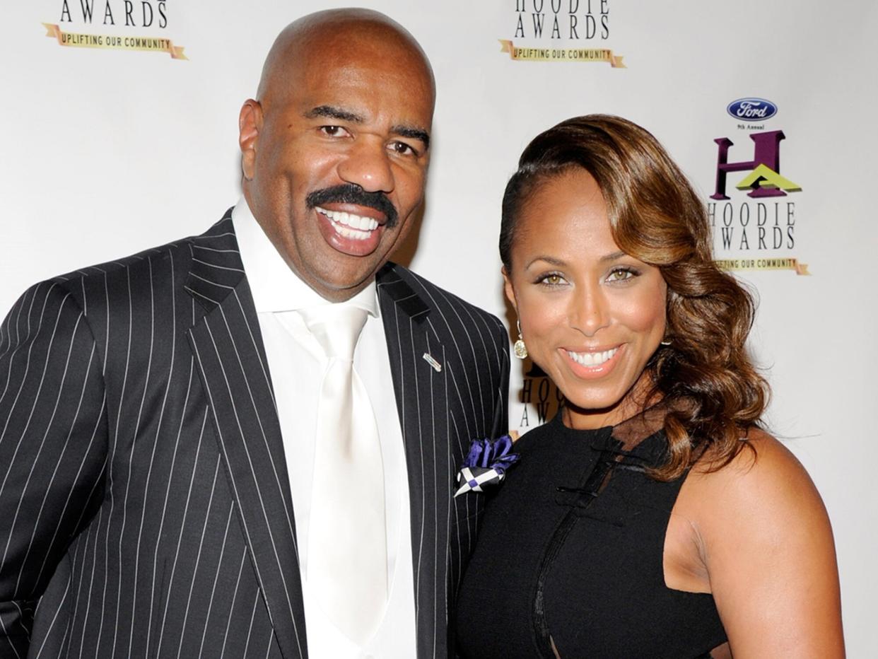 Steve Harvey (L) and wife Marjorie Harvey arrive at the ninth annual Ford Hoodie Awards at the Mandalay Bay Events Center August 13, 2011 in Las Vegas, Nevada