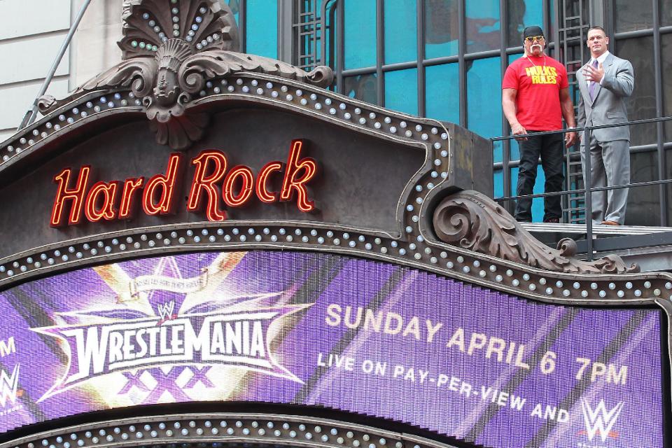 Hulk Hogan, left, and John Cena on top of the The Hard Rock Cafe during a news conference for Wrestlemania 30 on Tuesday, April 1, 2014 in New York. Wrestlemania 30 will be held on Sunday, April 6 in New Orleans . (AP Photo/Starpix, Dave Allocca) -PICTURED: Hulk Hogan and John Cena -PHOTO by: Dave Allocca/Starpix -File name: DA_14_701546.JPG -Location: The Hard Rock Cafe Editorial - Rights Managed Image - Please contact www.startraksphoto.com for licensing fee Startraks Photo New York, NY For licensing please call 212-414-9464 or email sales@startraksphoto.com