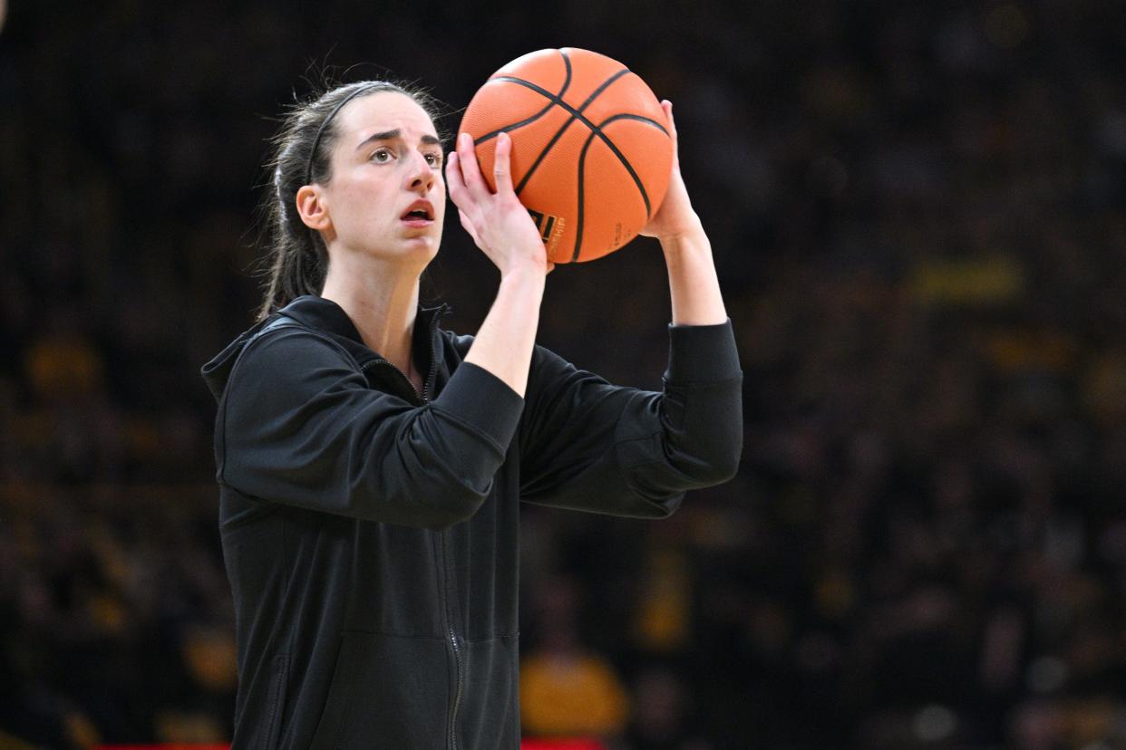 Mar 3, 2024; Iowa City, Iowa, USA; Iowa Hawkeyes guard Caitlin Clark (22) warms up before the game against the Ohio State Buckeyes at Carver-Hawkeye Arena. Clark is attempting to break the NCAA basketball all-time scoring record. Mandatory Credit: Jeffrey Becker-USA TODAY Sports