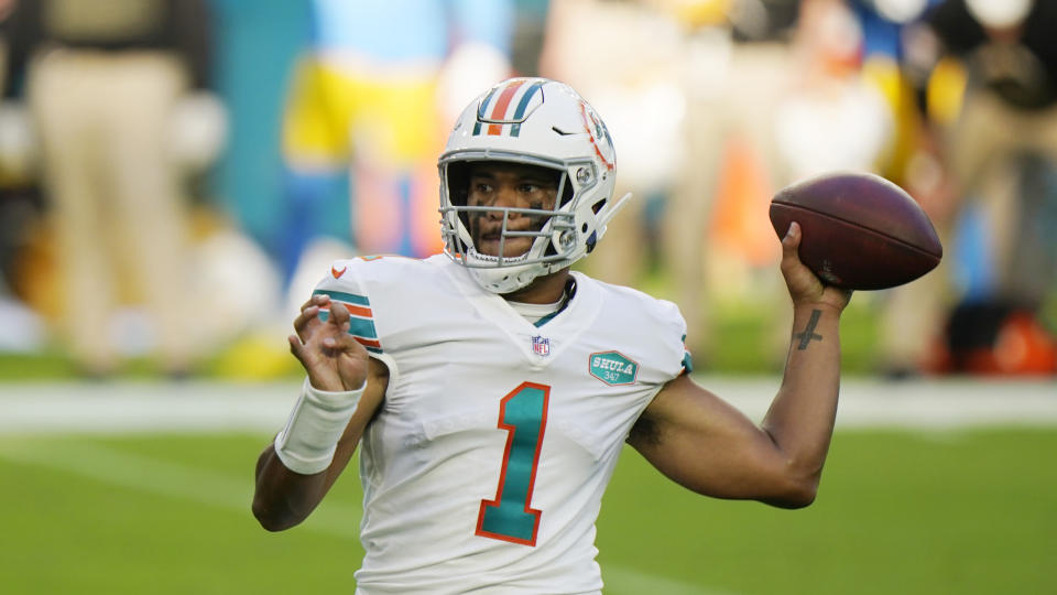 Miami Dolphins quarterback Tua Tagovailoa (1) looks to pass, during the first half of an NFL football game against the Los Angeles Chargers, Sunday, Nov. 15, 2020, in Miami Gardens, Fla. (AP Photo/Wilfredo Lee)
