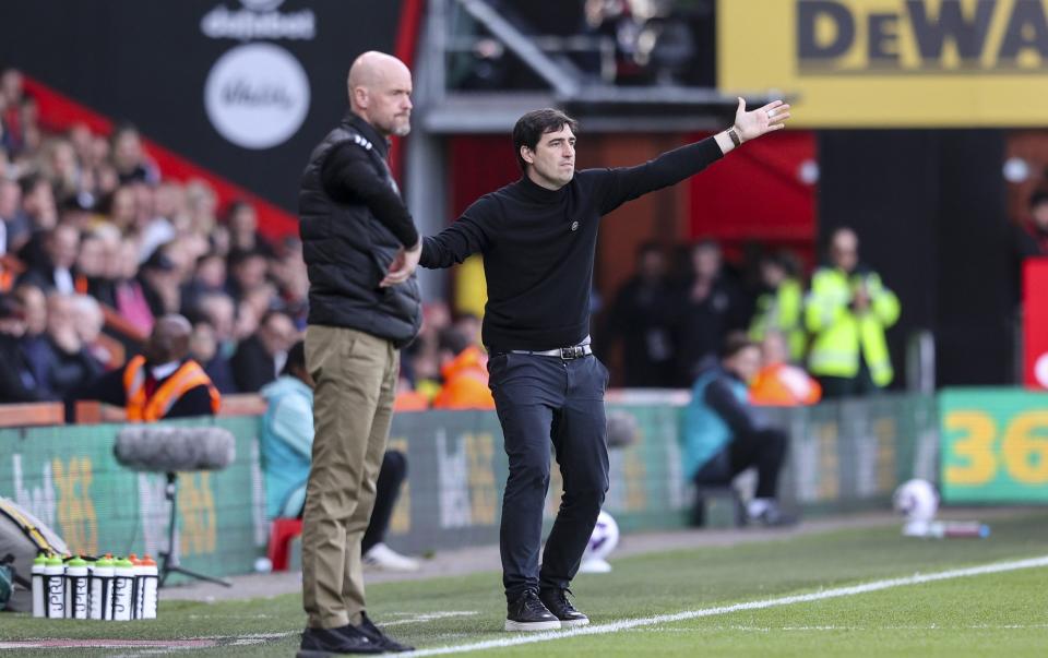 The head coaches Erik ten Hag and Andoni Iraola watch on.