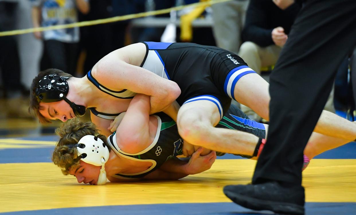 Brockport's Richard Wood, top, wrestles Avon/Geneseo's James Chase in the final of the 124-pound weight class during the Teike-Bernabi Wrestling Tournament, Friday, Dec. 29, 2023.