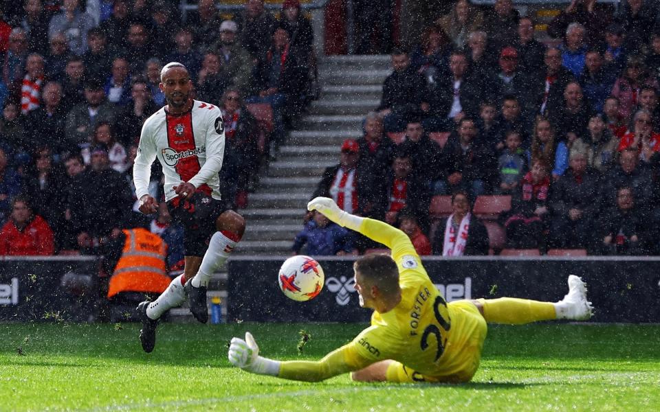 Tottenham Hotspur's Fraser Forster makes a save from Southampton's Theo Walcott - Reuters/Paul Childs