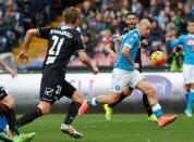 Football Soccer - Napoli v Carpi Serie A - San Paolo Stadium, Naples, Italy - 07/02/16. Napoli's Marek Hamsik (R) controls the ball. REUTERS/Stringer