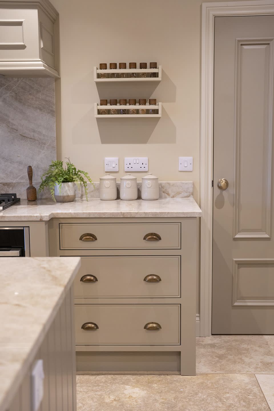 kitchen with beige cabinets