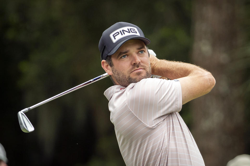 Corey Conners, of Canada, watches his drive down the ninth fairway during the second round of the RBC Heritage golf tournament in Hilton Head Island, S.C., Friday, April 16, 2021. (AP Photo/Stephen B. Morton)