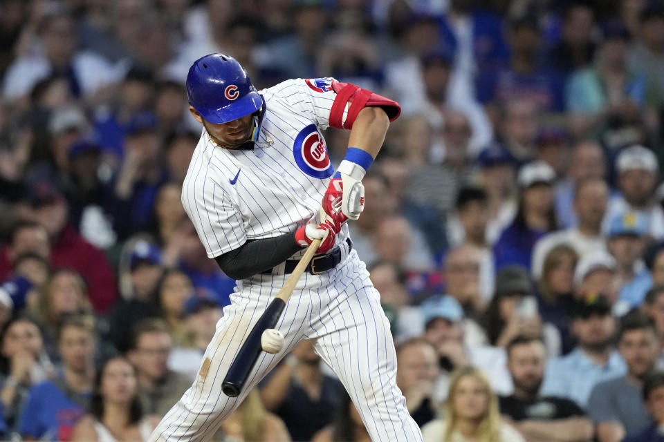 Chicago Cubs' Seiya Suzuki grounds out to New York Mets shortstop Francisco Lindor during the fourth inning of a baseball game Tuesday, May 23, 2023, in Chicago. (AP Photo/Charles Rex Arbogast)