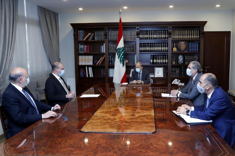 Lebanon's caretaker health minister Hamad Hasan meets with Lebanon's President Michel Aoun at the presidential palace in Baabda