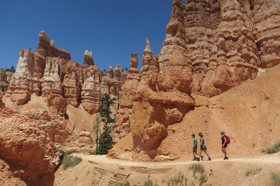 Visitors explore Bryce Canyon on July 17, 2014 in Utah. The state is known for its unique, moonscape-like geography.